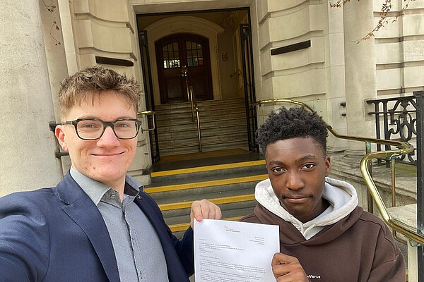 Ulysse and Timi petitioning for free school meals